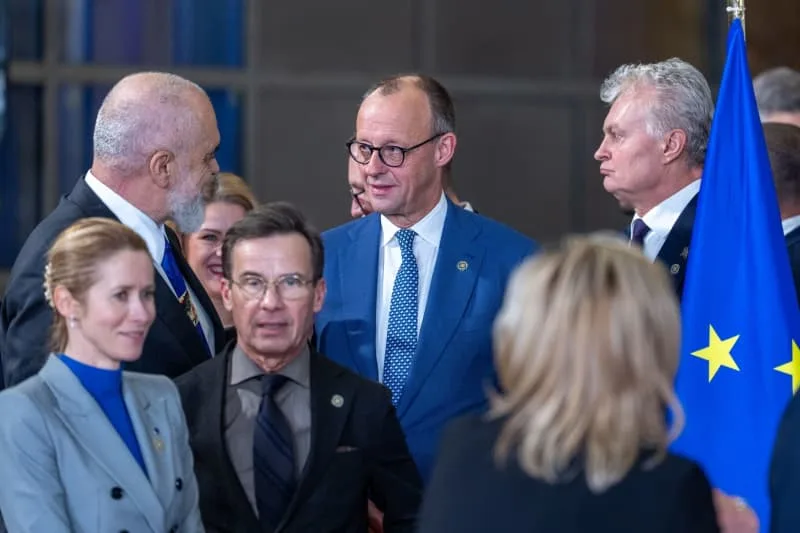 German Chancellor Friedrich Merz joins Albania's Prime Minister Edi Rama, Lithuania's President Gitanas Nauseda, Sweden's Prime Minister Ulf Kristersson and European Union foreign policy chief Kaja Kallas for a family photo at the EU–Western Balkans Summit. Michael Kappeler/dpa